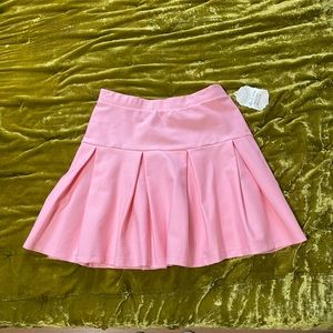 Bright baby pink pleated tennis skirt